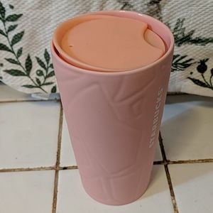 Pink ceramic Starbucks cup